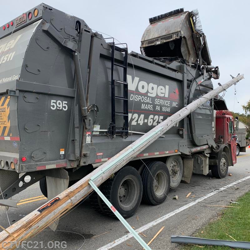Garbage Truck Takes Down Power Lines Intersection of Garvin Road and